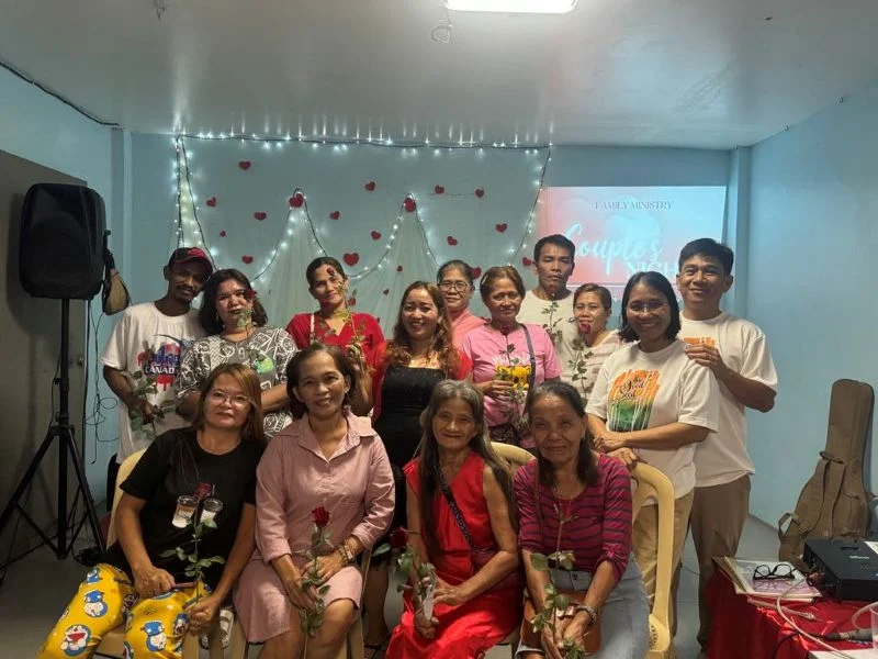 Family Ministry outreach with families in Smokey Mountain, Manila